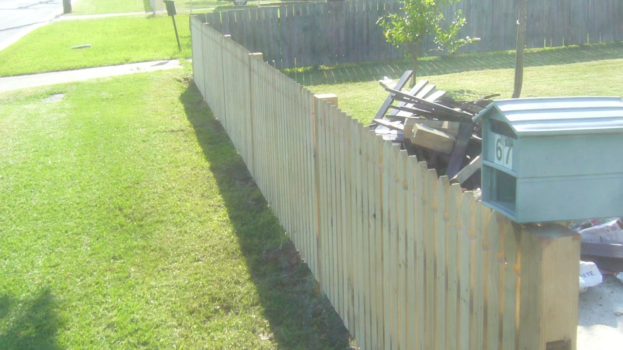 Treated pine timber fence part-way through installation at a property in Toongabbie, Sydney