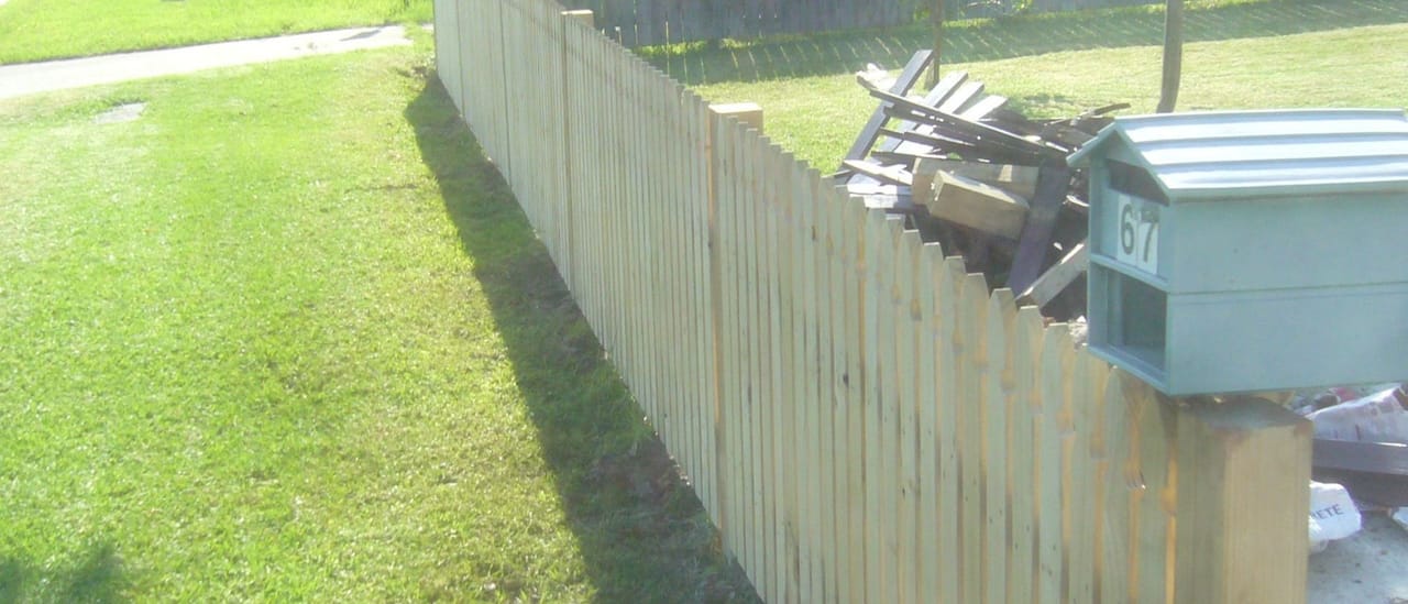 Treated pine timber fence part-way through installation at a property in Toongabbie, Sydney